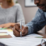 Closeup-of-businessman-hand-si- jackimwoods